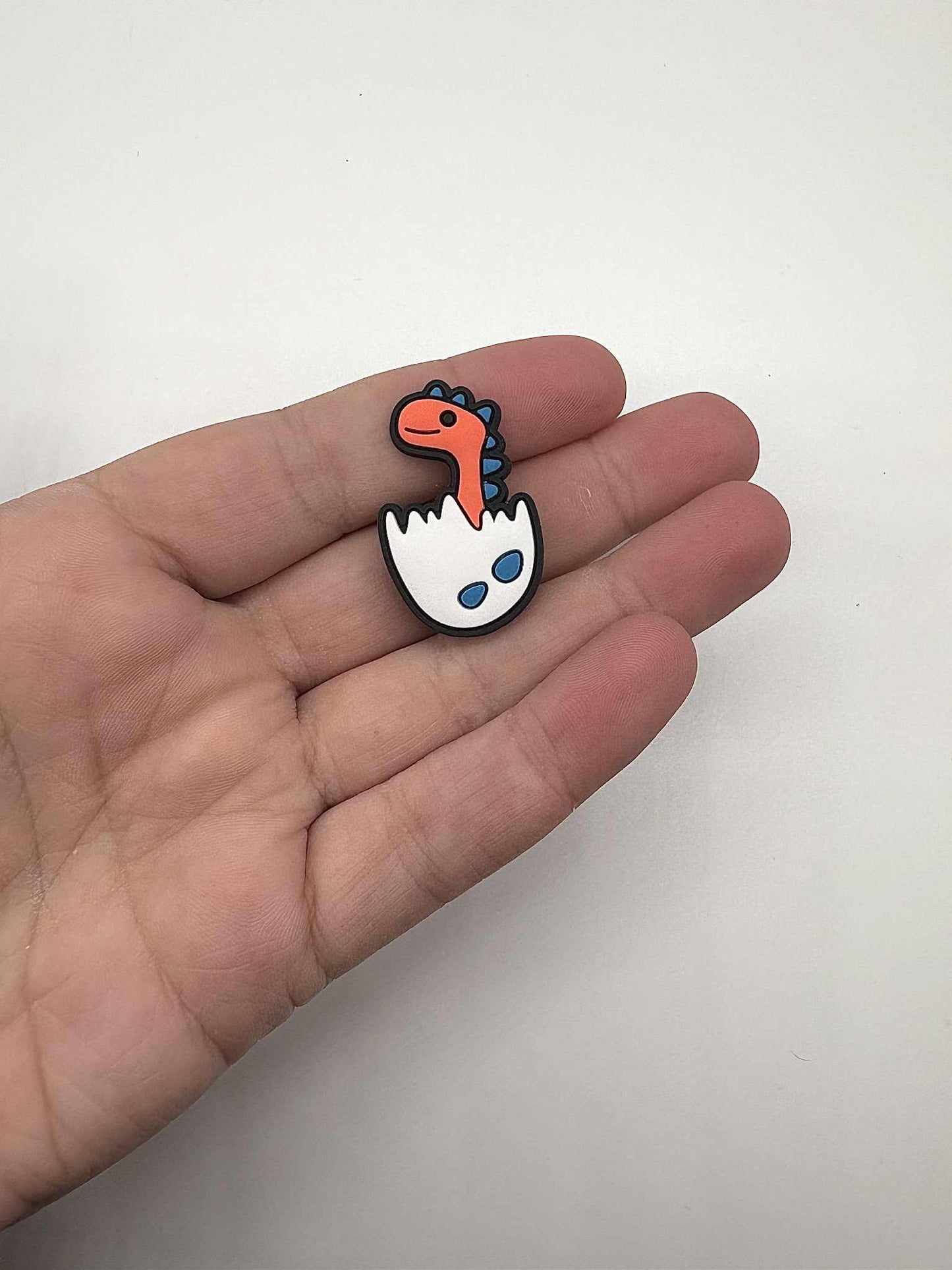 Orange Dinosaur In Egg Shoe Charm