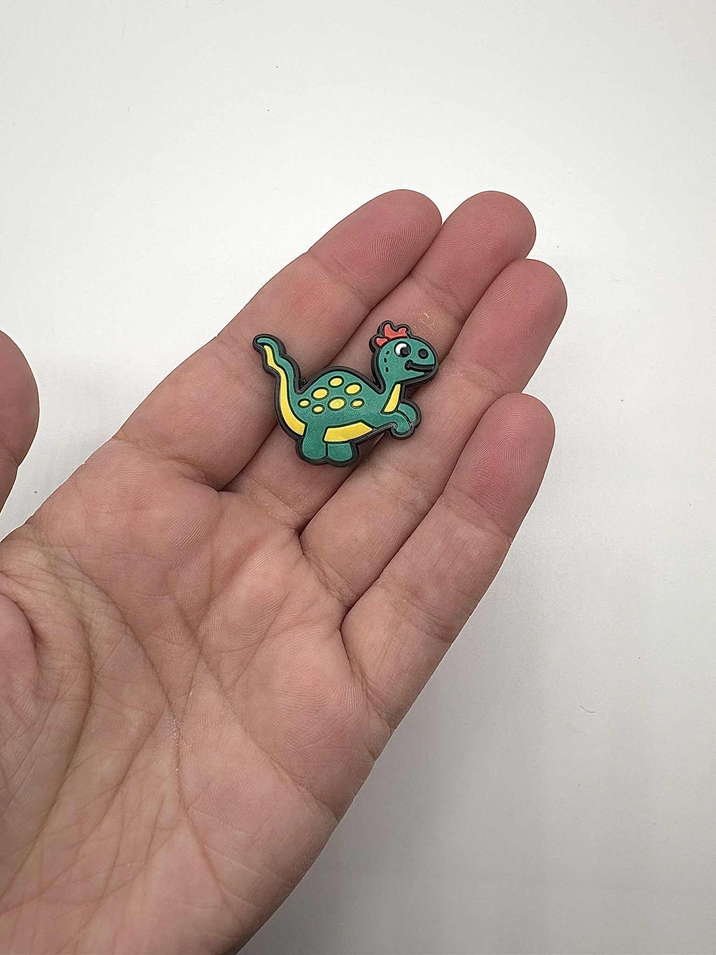 Dinosaur with Orange Hair Shoe Charm